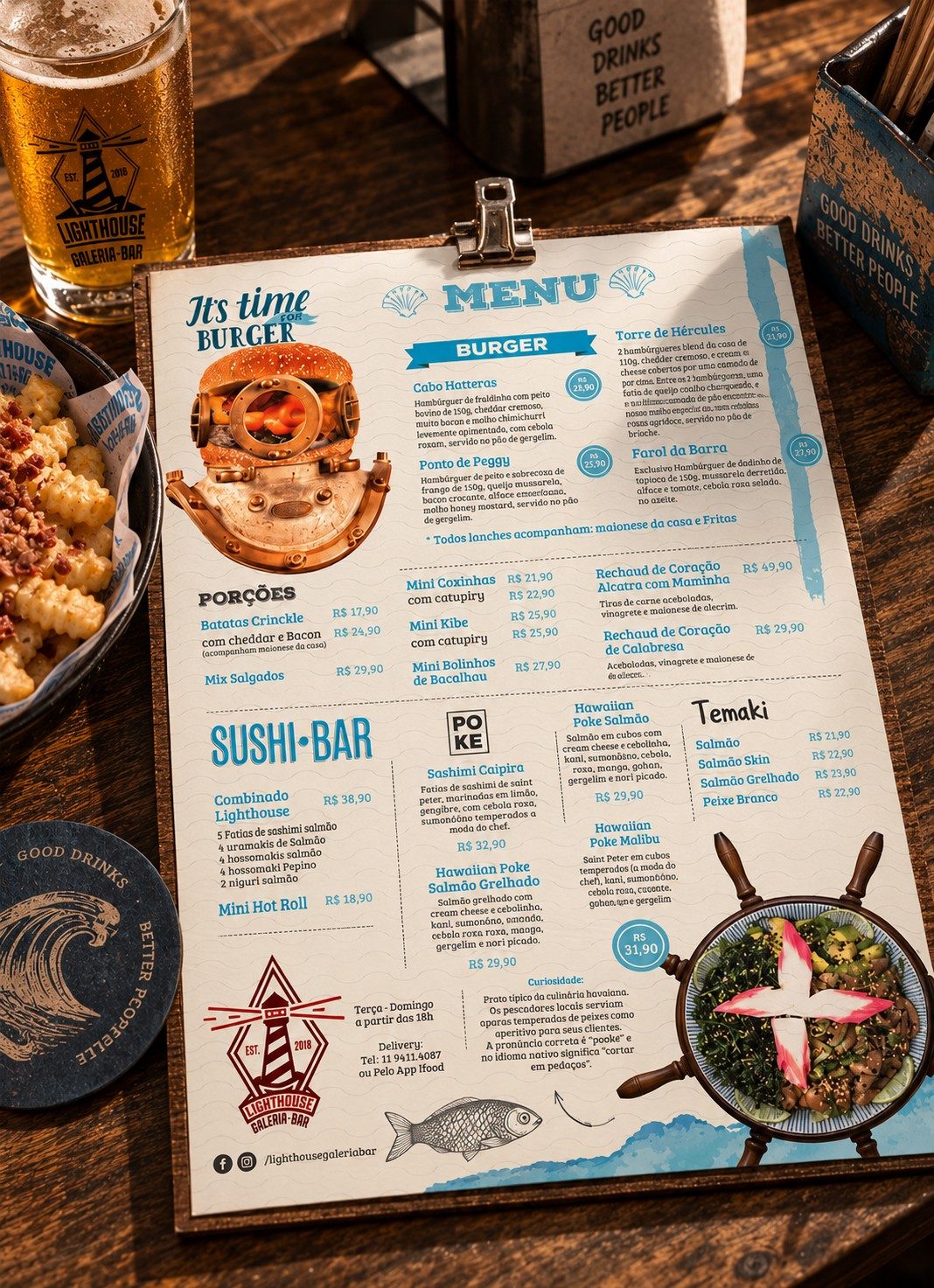 Menu Bar Lighthouse burger and sushi menu on a clipboard on the table, next to a beer, fries and the chopstick holder
